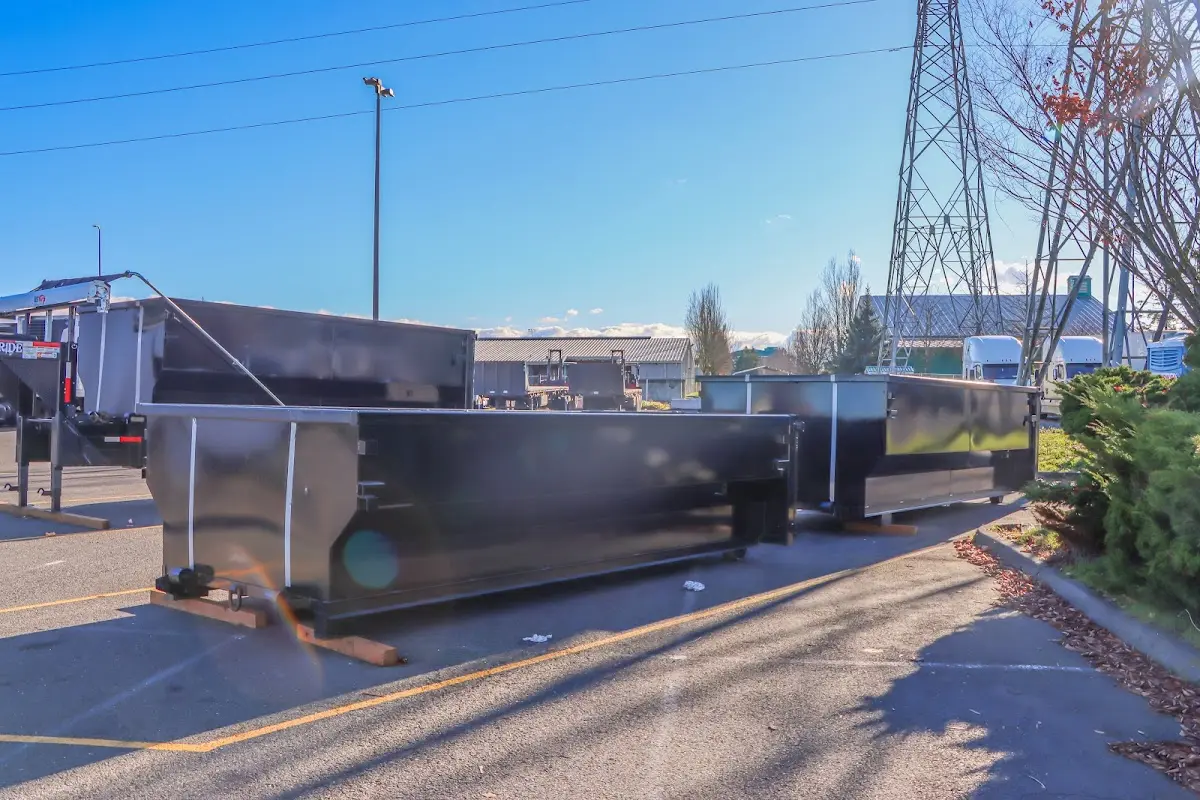 Roll-off dumpster ready for waste disposal at job site for Concrete Dumpster Rental in Upper Hanover